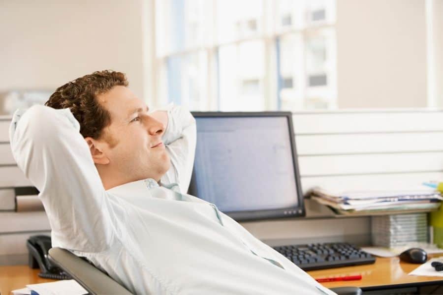 young man recline on office chair