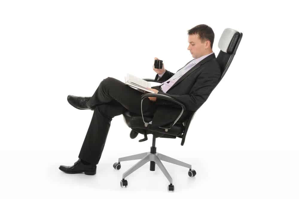 businessman on big tall office chair