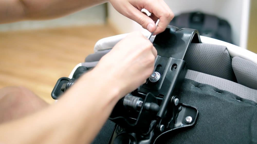 man repairing damaged office chair