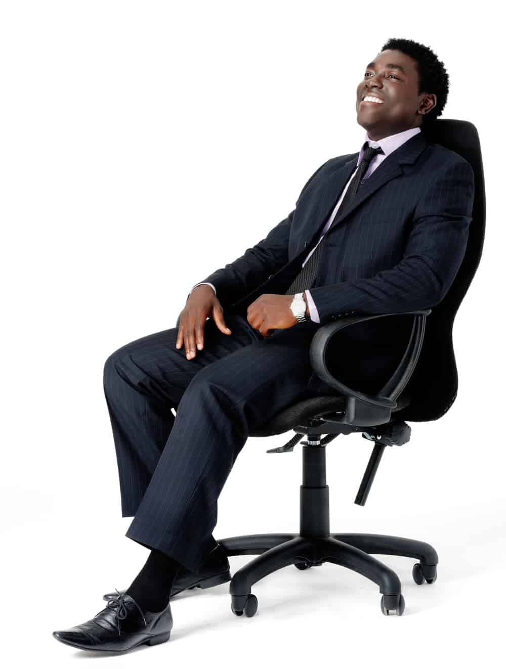 black businessman sitting in high back office chair