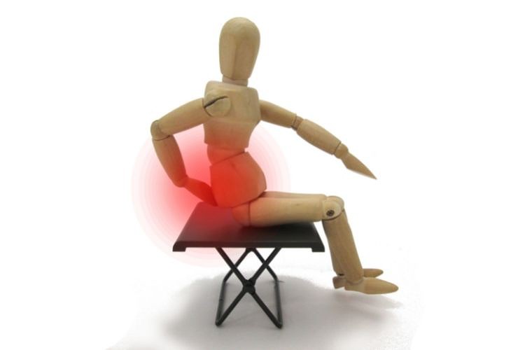 what causes tailbone pain when you sit