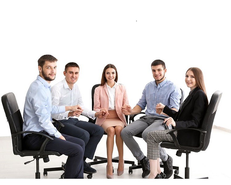 Group of people sitting on steelcase chairs