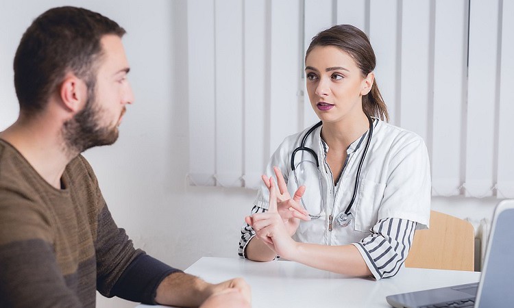 Man advising with a doctor