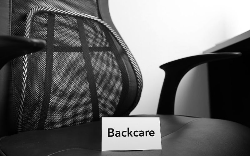 Office chair has lumbar support and back care note