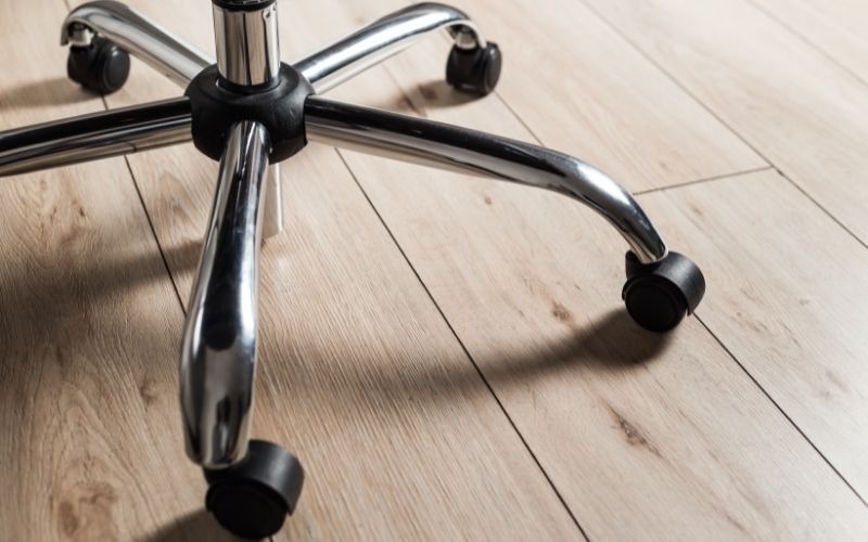 Office chair wheels on wood floor