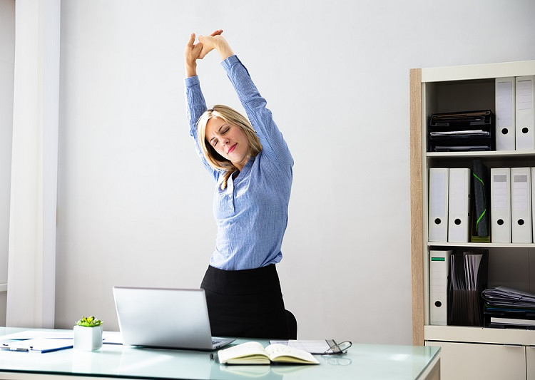 Stretch your body at working desk