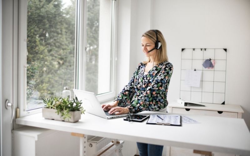 Woman working at a standing desk