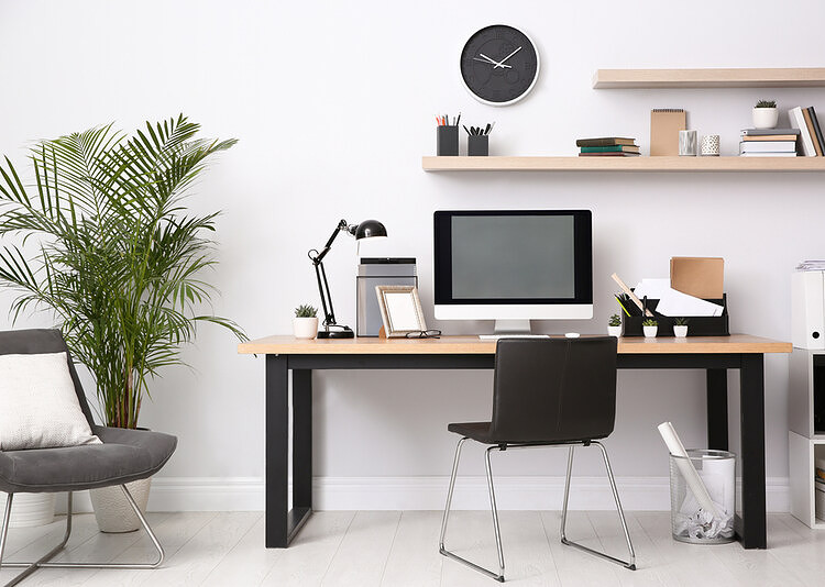 modern computer on Steelcase desk in office interior