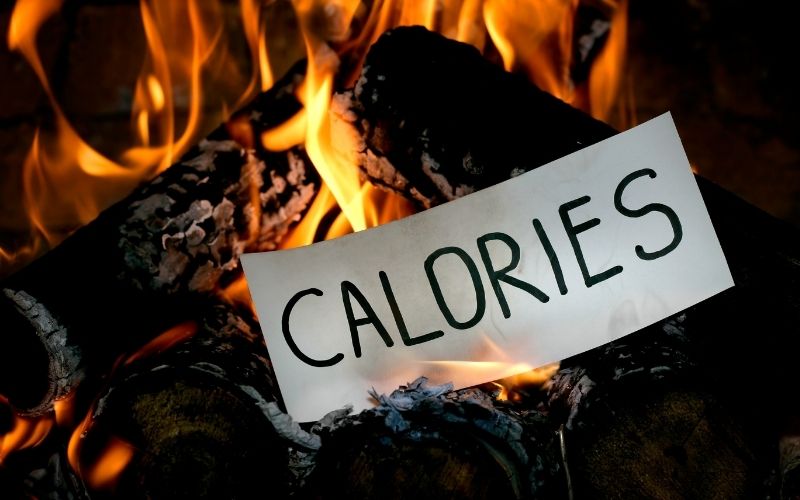 Burning paper writing word Calories