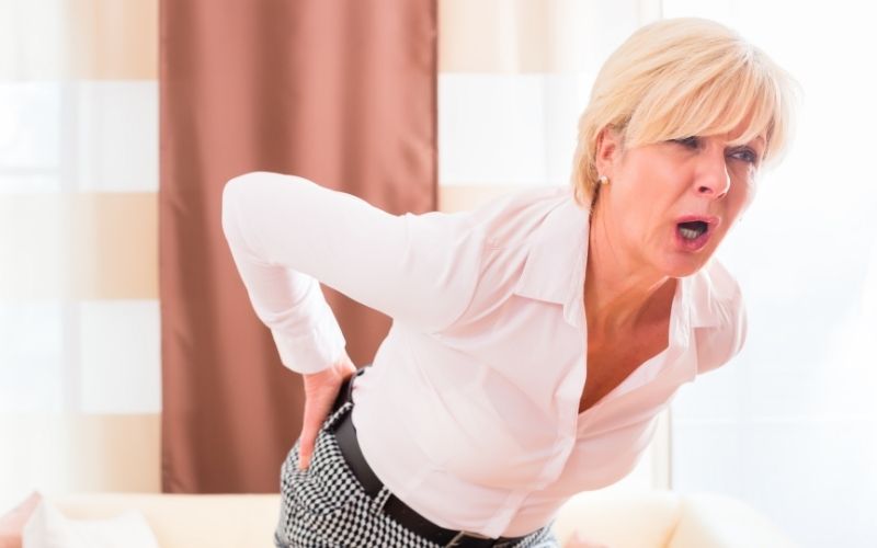 Business woman suffer from sciatica pain