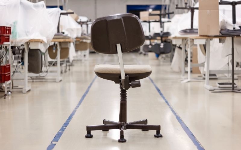 Imbalance office chair in closed factory