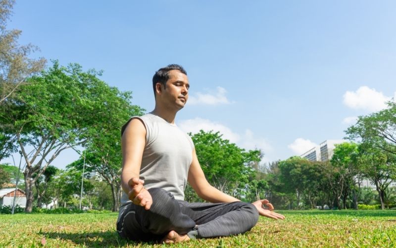 Man meditating outdoor