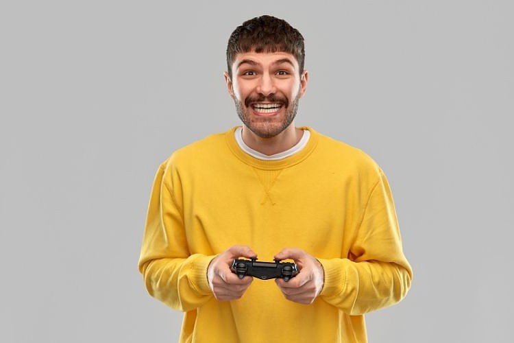 Man standing and playing game