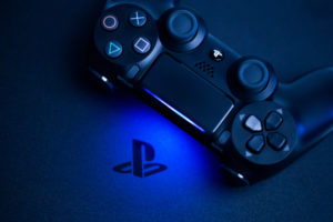 A PS4 controller on a black background
