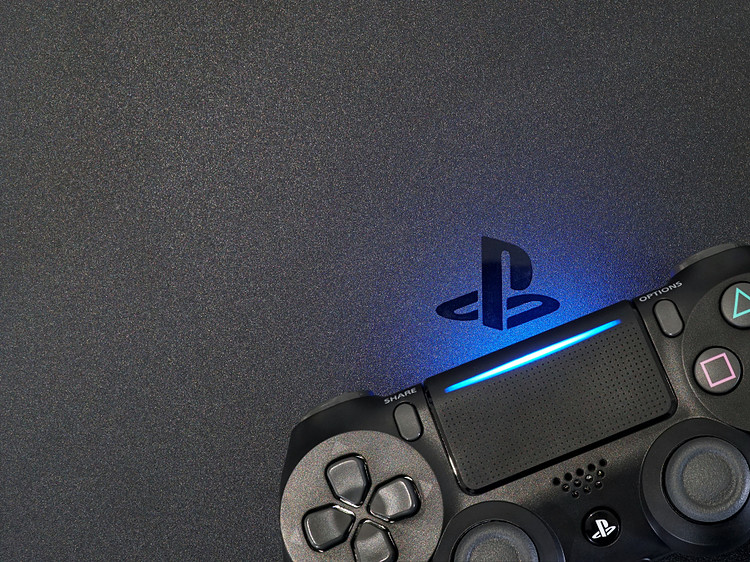 A close-up shot of PS4 and controller