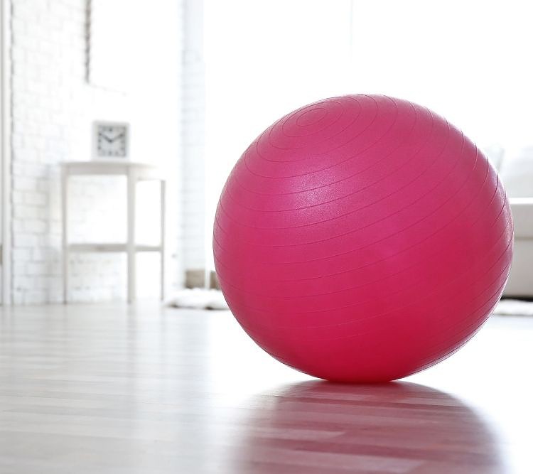 A pink exercise ball