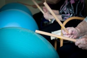 Cardio drumming with exercise ball