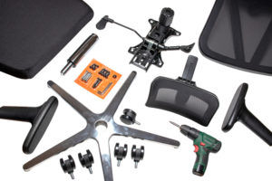 Office chair parts on the  ground