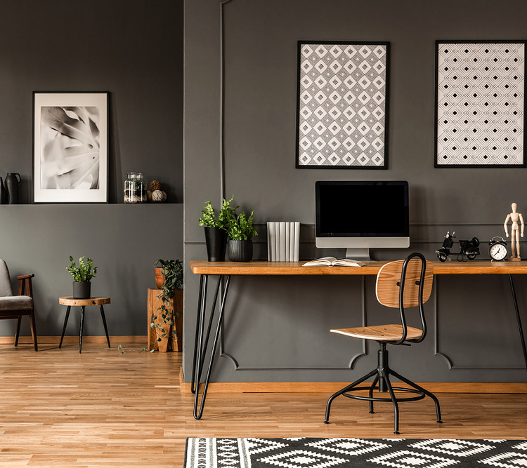 A home office with black theme