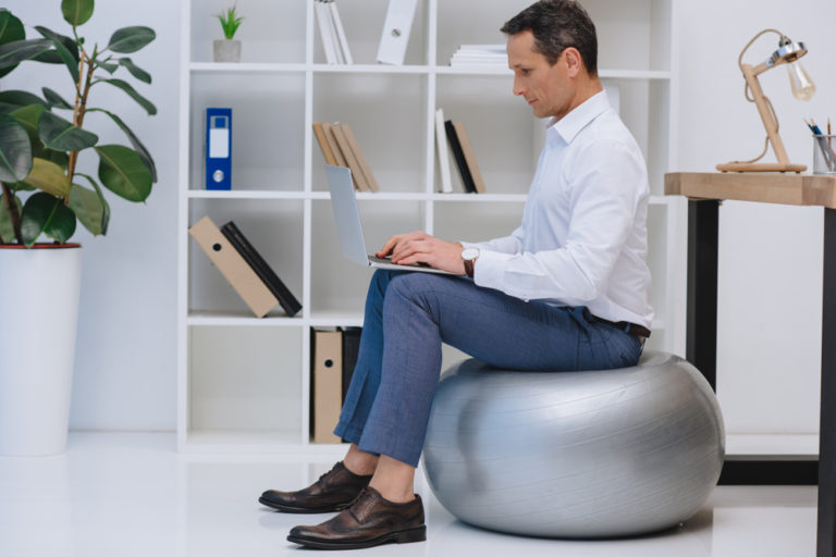 Can You Sit on an Exercise Ball All Day? To Ergonomics