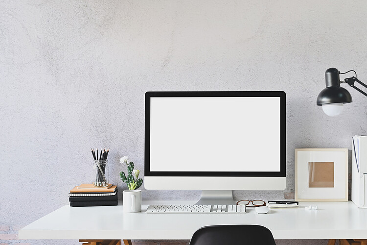 Office supplies on a white table